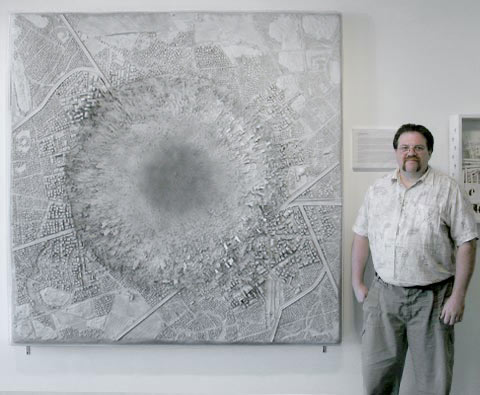 Artist Thomas Keefer standing next to "The Imminent Thunder"